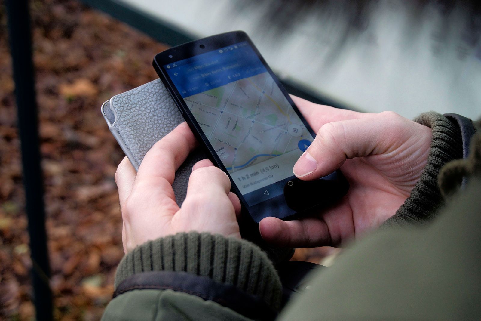 Google Maps and a business listing displayed on a smartphone